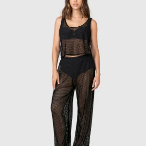 Set en malla, pantalón y camiseta