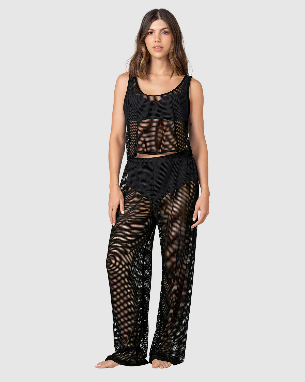 Set en malla, pantalón y camiseta