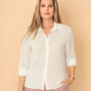 Blusa manga larga elaborada en tela con transparencia