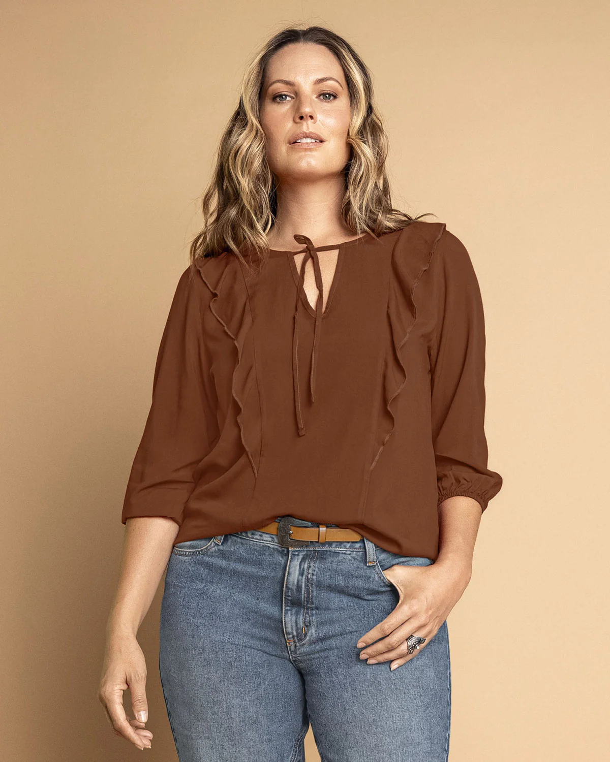 Blusa manga 3/4 con boleros sobrepuestos en frente