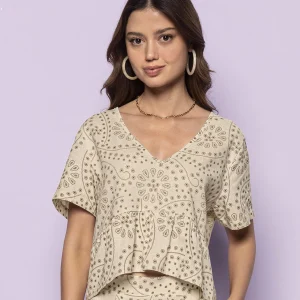 Blusa manga corta estampada con bolero en ruedo